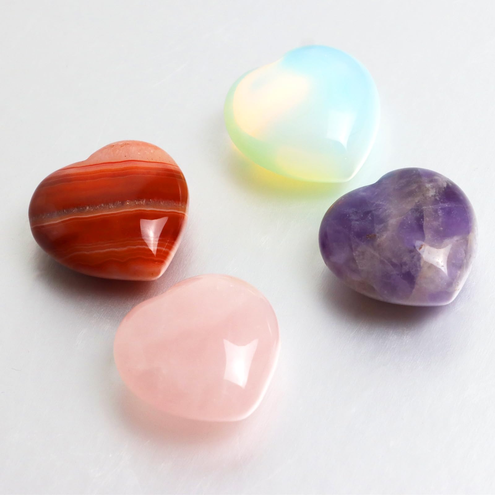 Togous velvet pouch with crystal hearts, a thoughtful gift for crystal lovers.