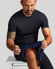 Tommie Copper infrared elbow wrap ready for at-home joint comfort routines.
