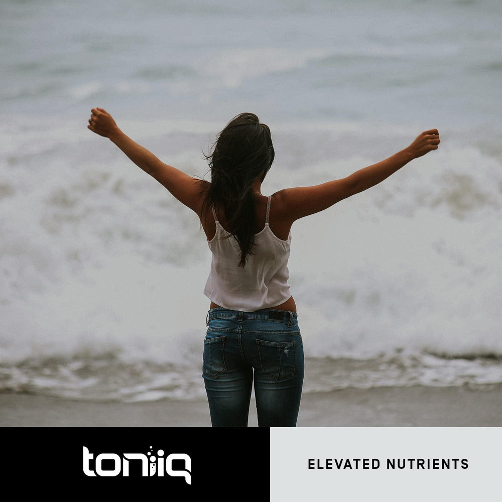 Toniiq Pomegranate Extract serving scoop illustrating measured 120 capsules.