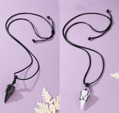 Top Plaza clear quartz pendant close-up showing clarity for versatile looks.