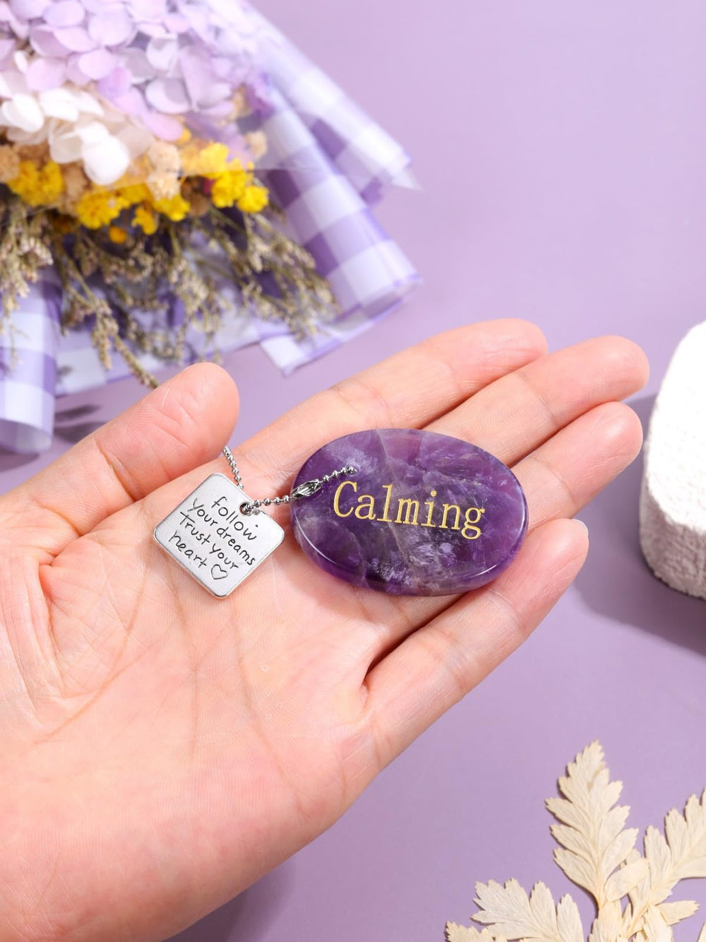 Top Plaza pocket crystal palm stone ideal for meditation on the go.