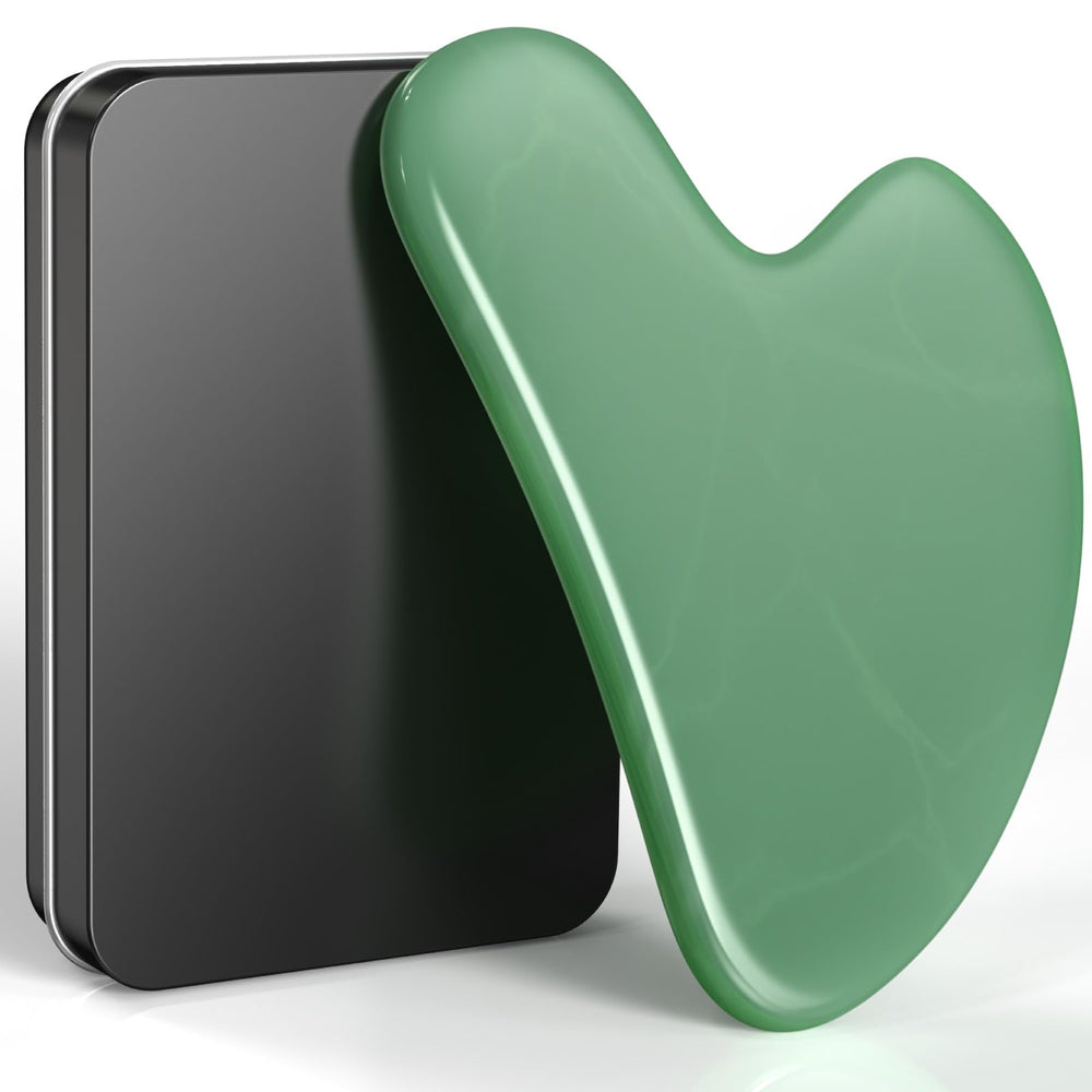 Tophld Green Gua Sha tool close-up for facial massage and jawline definition.