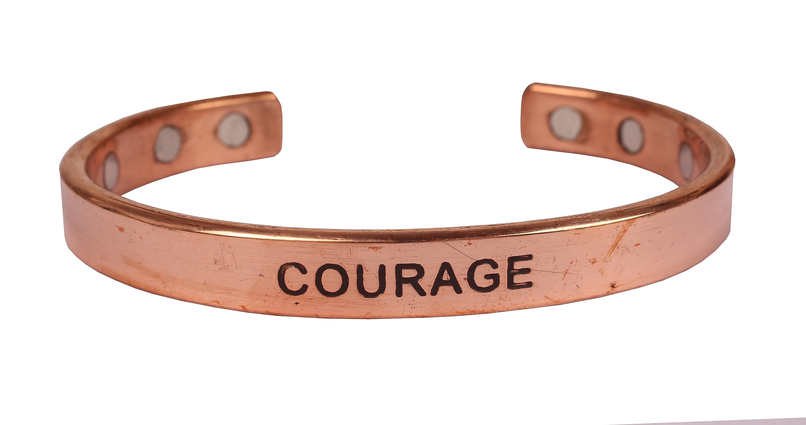Touchstone copper bracelet close-up showing COURAGE engraving for daily motivation