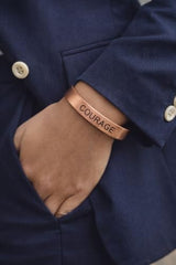 Touchstone bracelet on model wrist highlighting adjustable fit for comfort