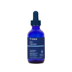 Trace Minerals Ionic Calcium bottle being poured to support bone health
