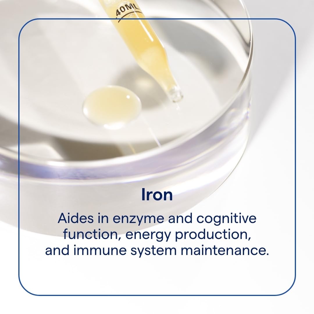 Trace Minerals Ionic Iron drops poured into juice, easy daily use.