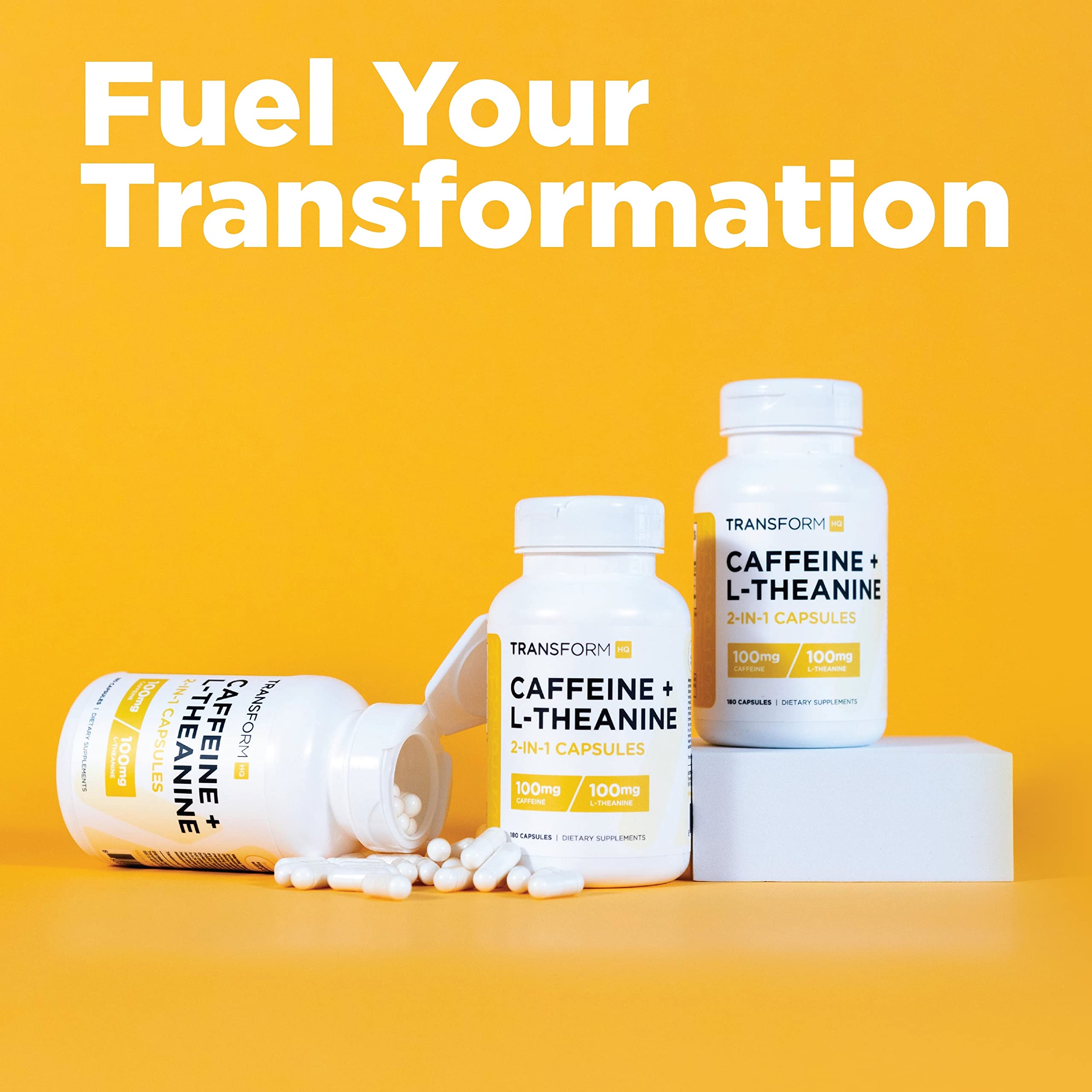 TransformHQ glass of water beside capsules for on-the-go focus.
