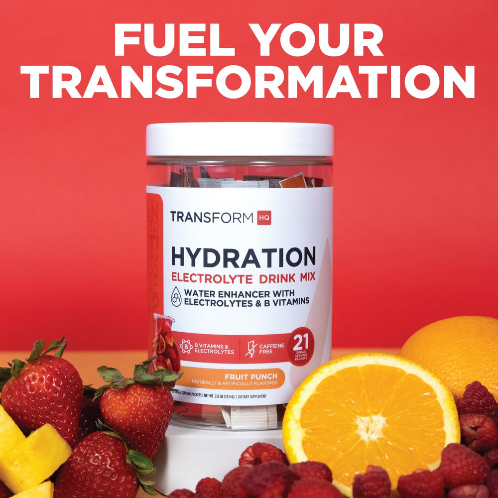 Water bottle beside TransformHQ packets for everyday hydration