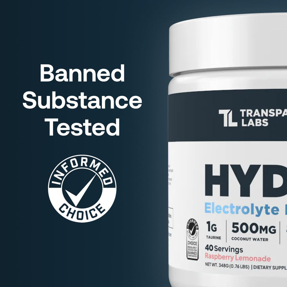 Transparent Labs Hydrate tropical-punch powder ready to mix for workouts.