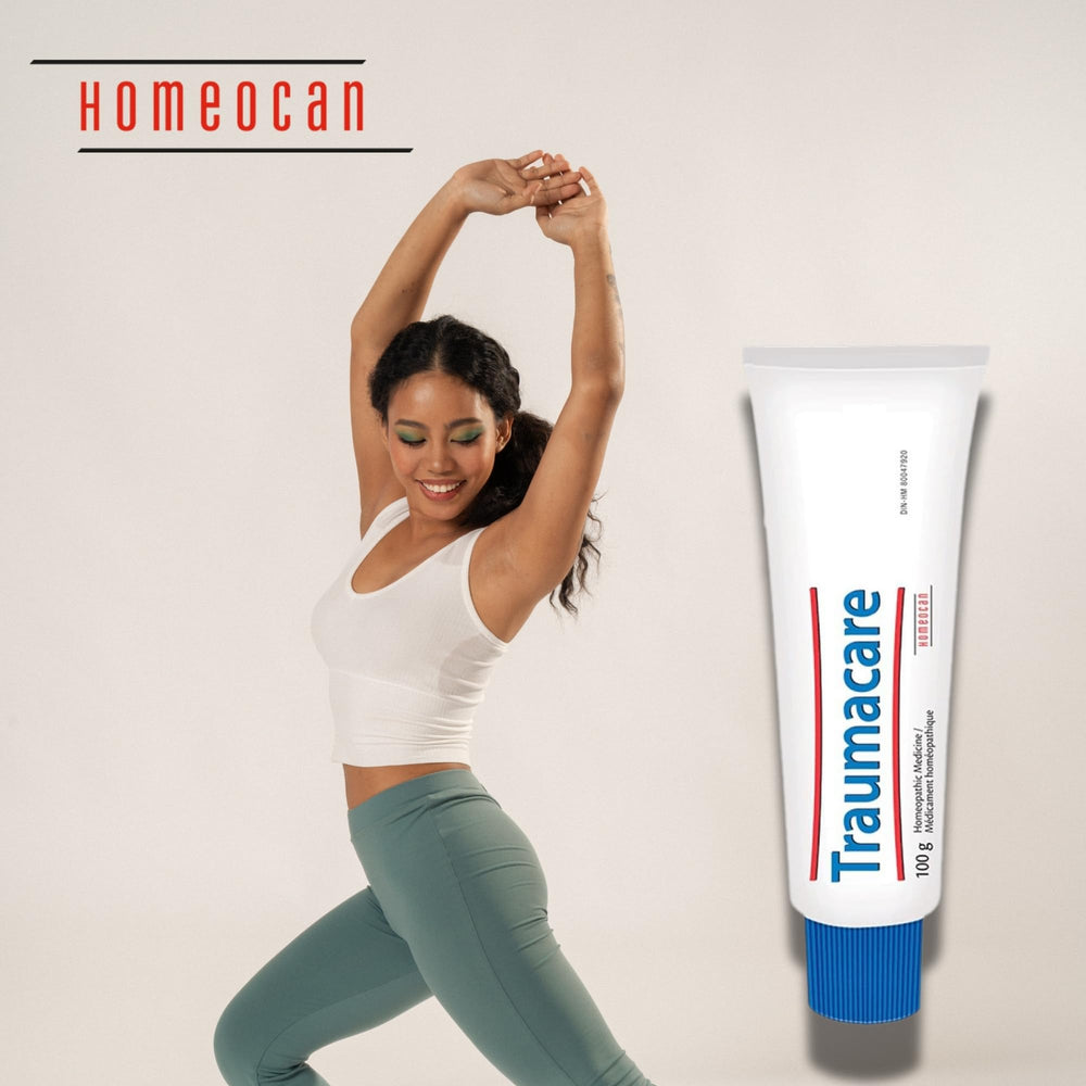 Applying Traumacare Cream to shoulder for targeted comfort.