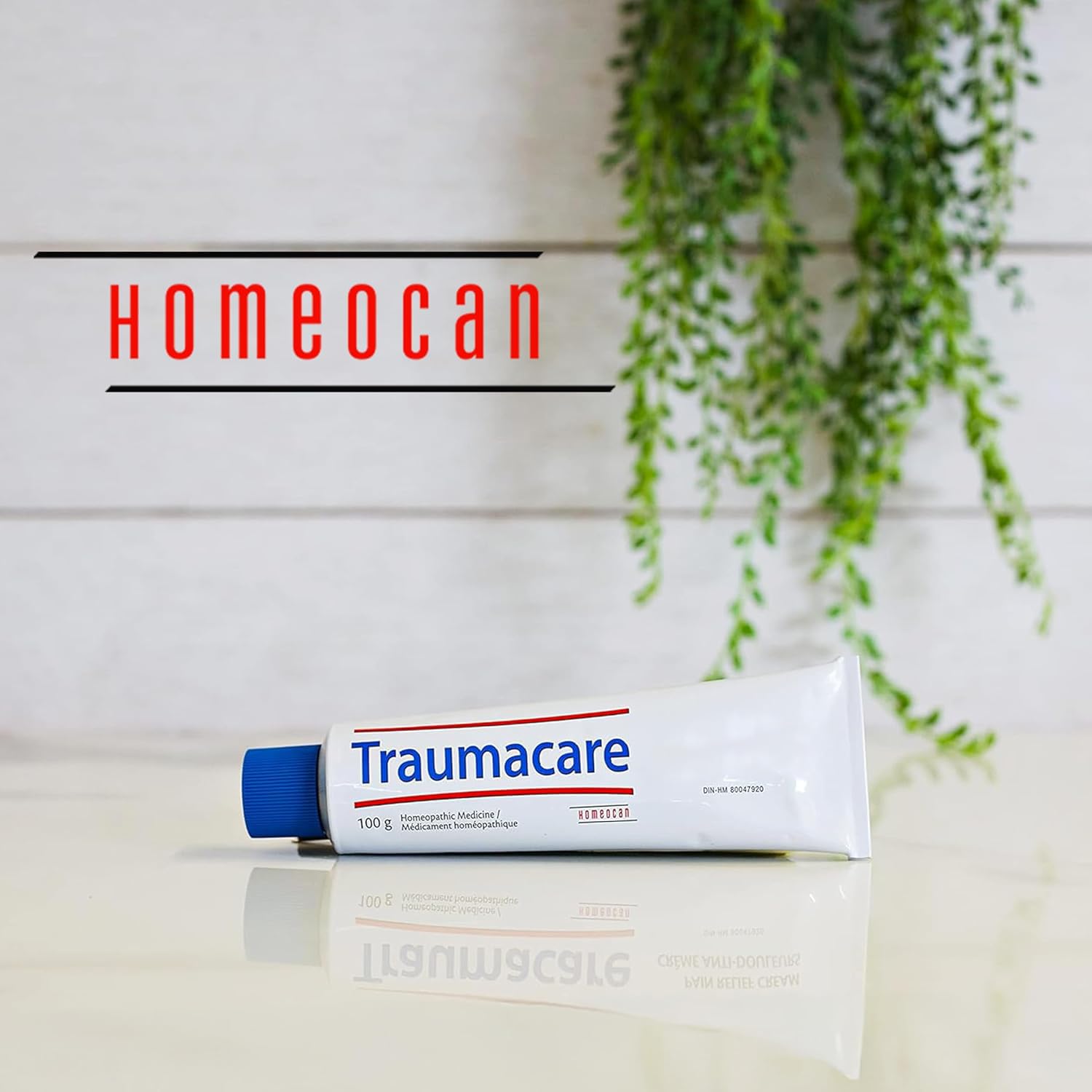 Traumacare Cream on bathroom shelf showing convenient packaging.