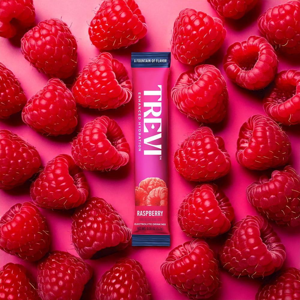 TREVI Raspberry electrolyte powder stirred into water for quick hydration