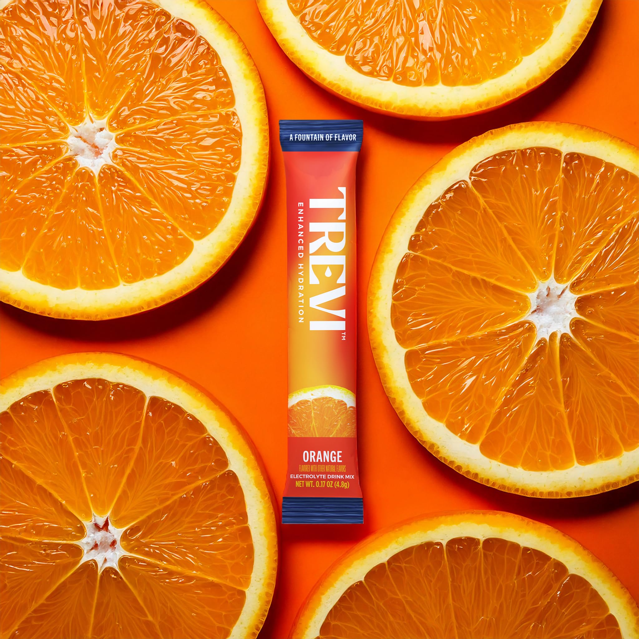 TREVI orange electrolyte stick dissolving in 16 oz water for bold flavor