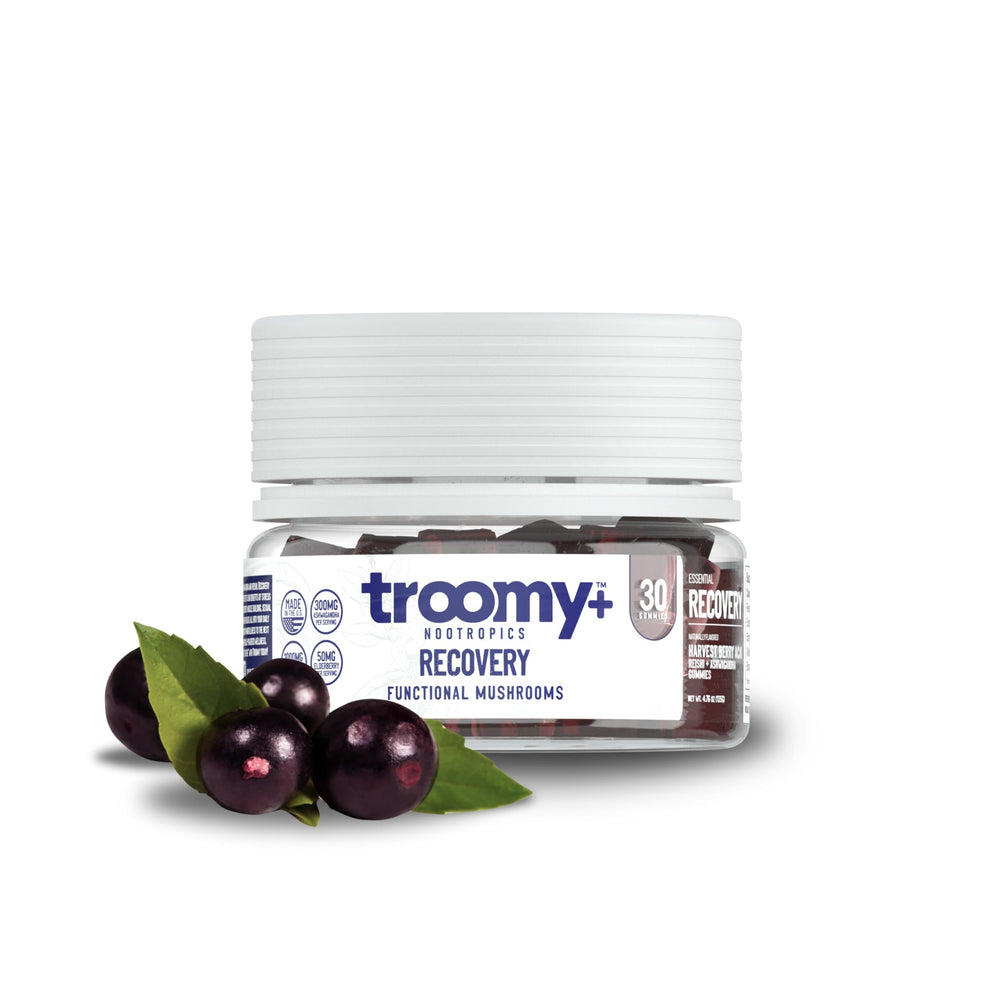 Troomy Recovery Gummies bottle front shows berry-acai flavor and vegan daily wellness benefits