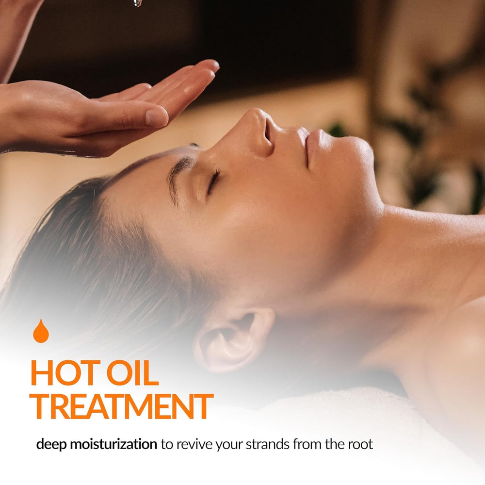 Hands applying Tropic Isle Living JBCO to hair strands for strength and shine.