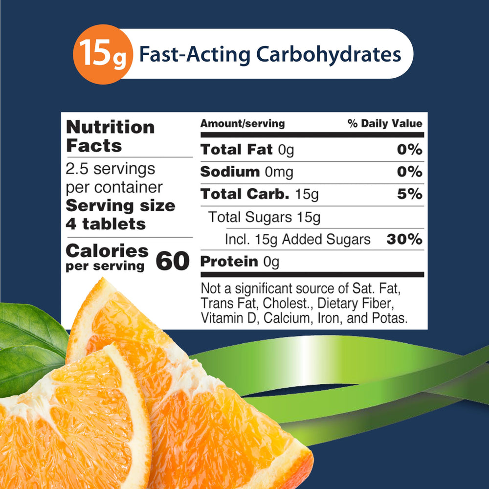 Close-up of TRUEplus Glucose Tablets orange tablet highlighting fast-acting carbs.