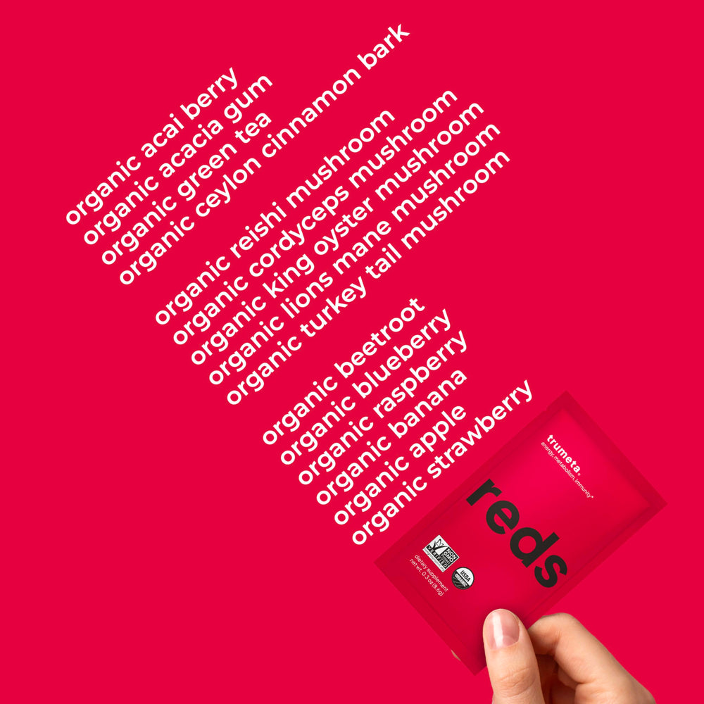 TRUMETA Reds powder berry blend close up, highlighting antioxidant rich ingredients for daily wellness.