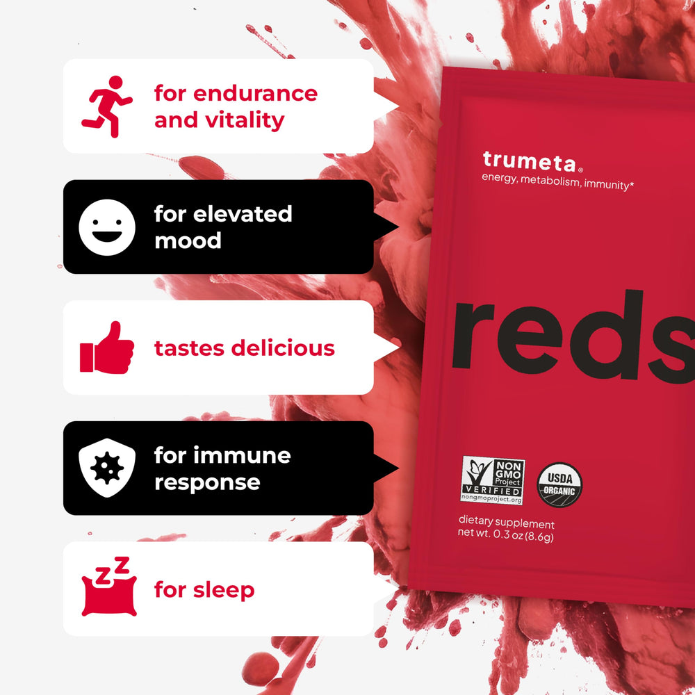 TRUMETA Reds powder mixed in water creating a vibrant berry drink for quick energy.
