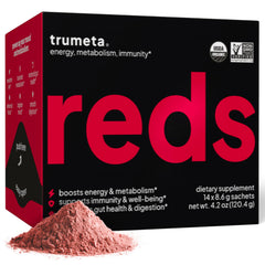 TRUMETA Reds powder packaging on table showing USDA organic certification and convenience for on the go.