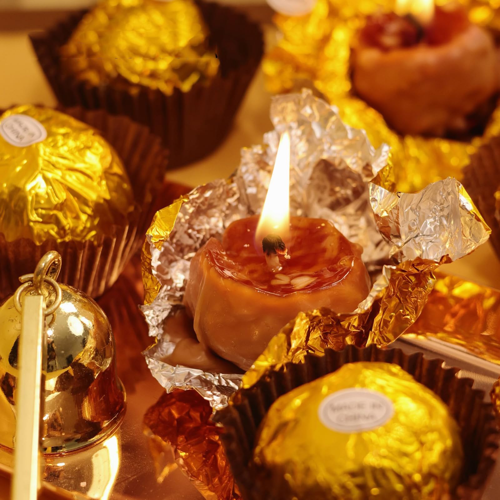 T-shin chocolate ball candle four-pack in gold for elegant table decor