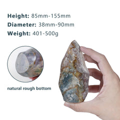 TUMBEELLUWA Ocean Jasper flame-tower on shelf brings calm and focus to spaces.