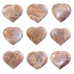 TUMBEELLUWA orange moonstone puff stone enhances desk or shelf display.