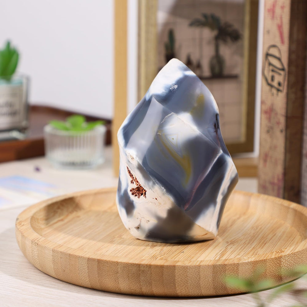TUMBEELLUWA Orca Agate Flame Tower stable base keeps it steady on desks or shelves.