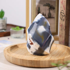 TUMBEELLUWA Orca Agate Flame Tower stable base keeps it steady on desks or shelves.