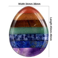 TUMBEELLUWA tiger's eye worry stone close-up for focus and confidence.