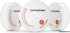 Three-tin display of Tummy Drops packaging featuring USDA Organic label.