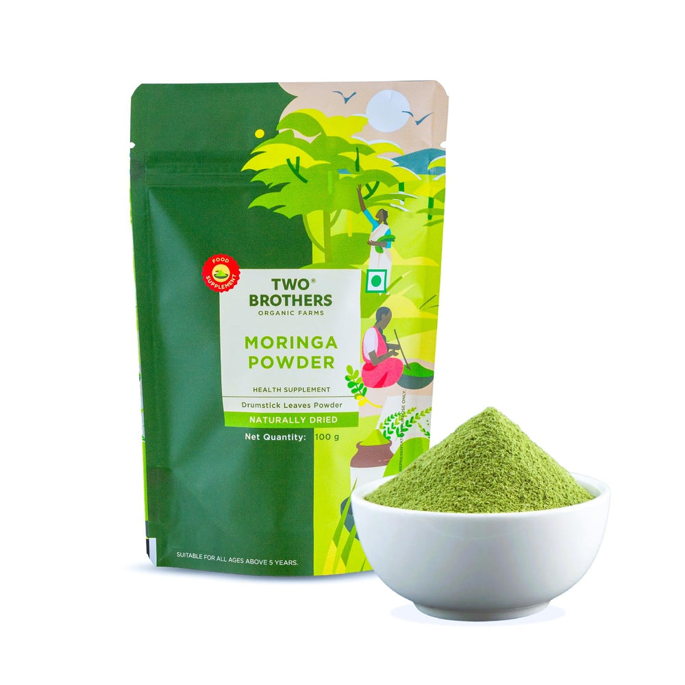 Two Brothers Organic Farms moringa leaf powder tub ready for smoothies