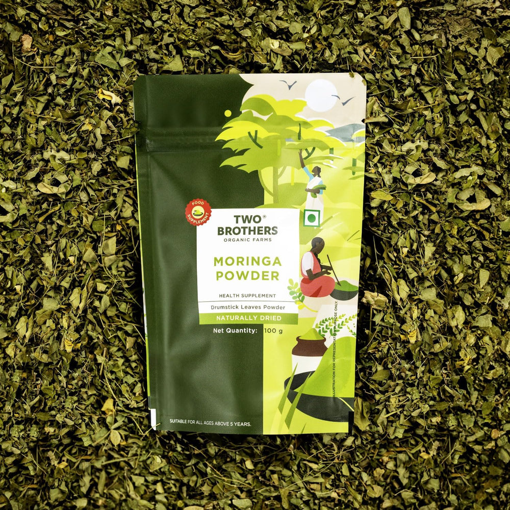 Sprinkled moringa powder over a fresh salad bowl by Two Brothers