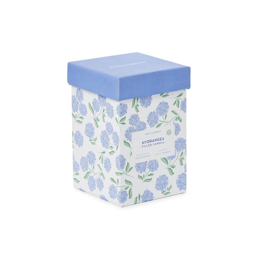 Two's Company Hydrangea Candle emits fresh blooms scent for a calming atmosphere.