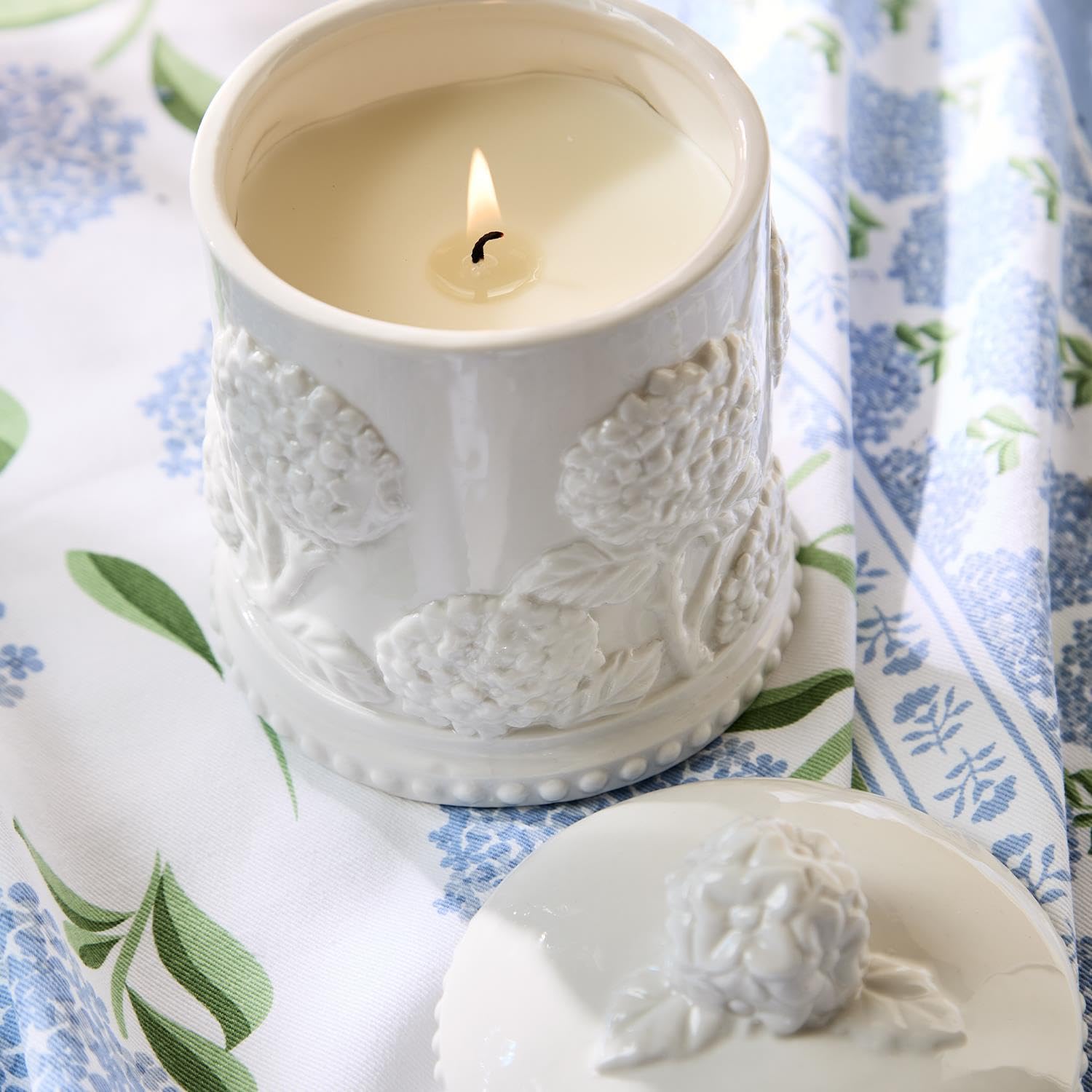 Elegant gift box packaging makes Two's Company Hydrangea Candle a thoughtful present.