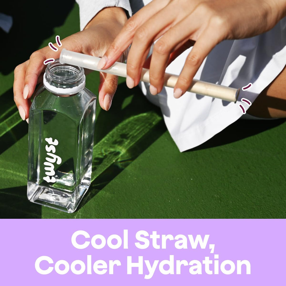 Twyst glass with sparkling water reveals peach-lavender-honey flavor