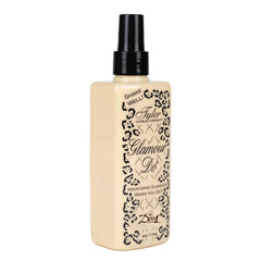 TYLER Diva Glamour Do spray being applied to the toilet bowl before use
