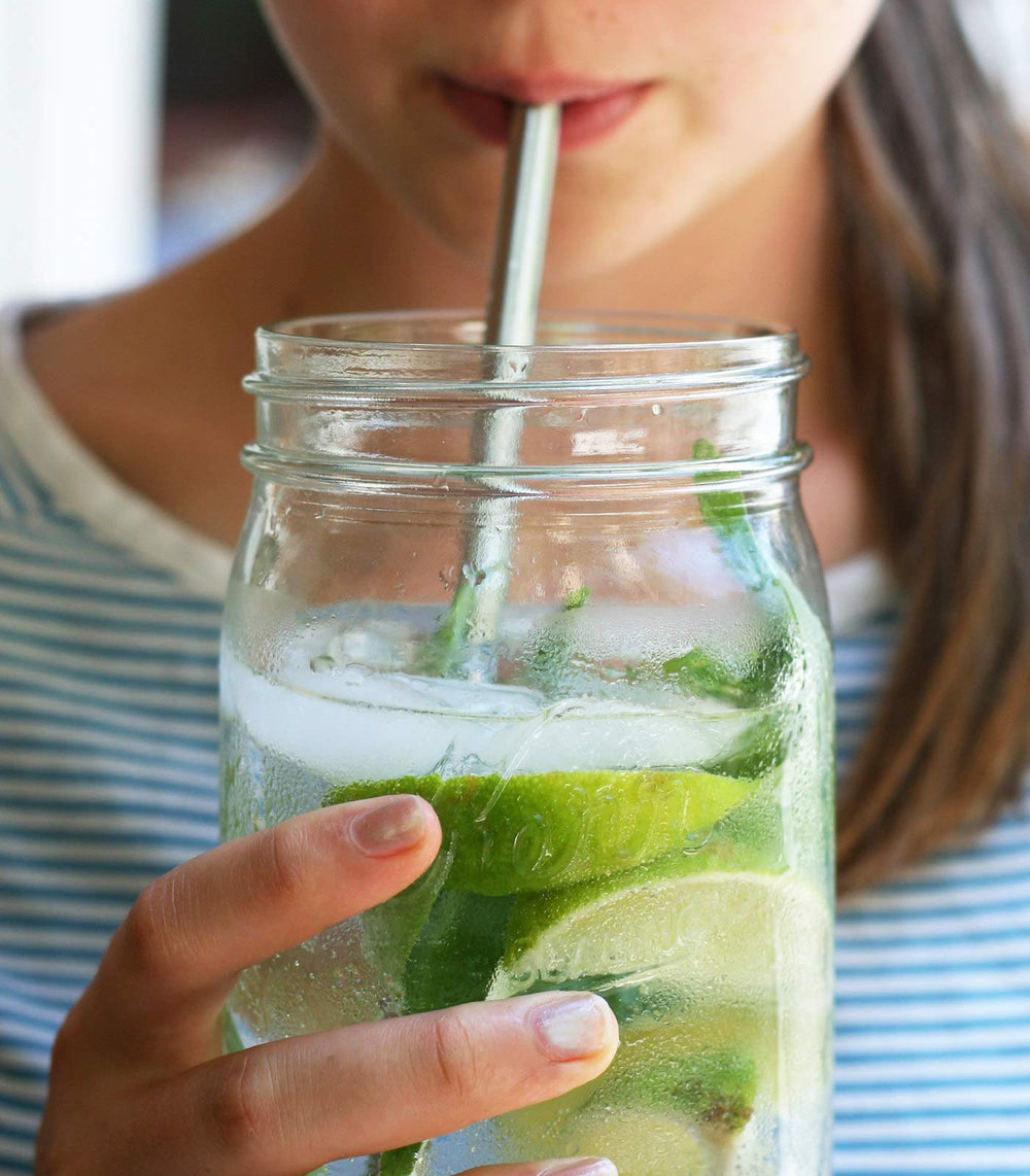 U-Konserve stainless steel straw in use with glass or metal drinkware
