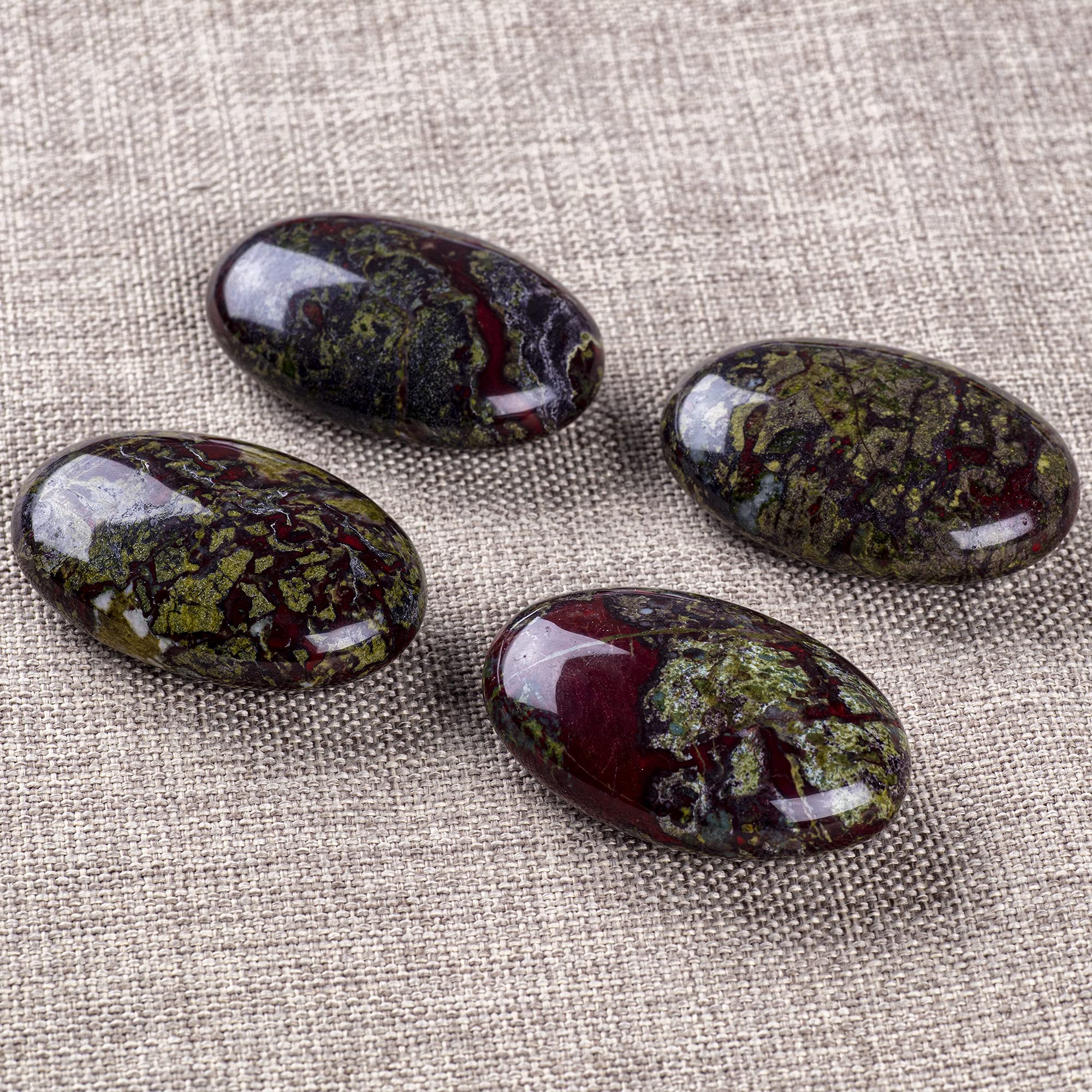 UFEEL Dragon Blood palm stone texture close-up showing smooth polish.