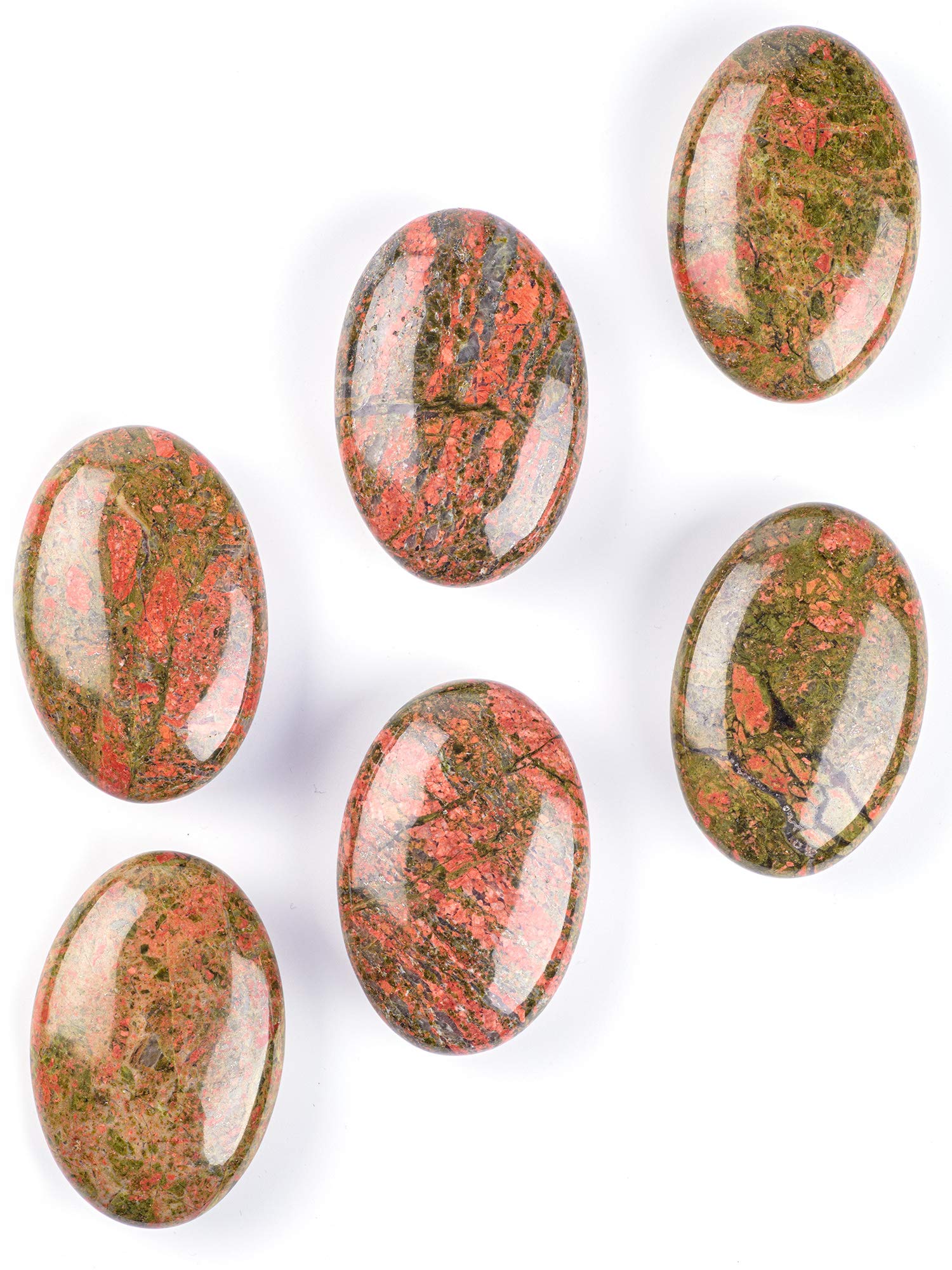 Texture detail of UFEEL Unakite palm stone showing natural variation.