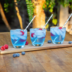 Ultima Replenisher blue raspberry glass with ice ready drink
