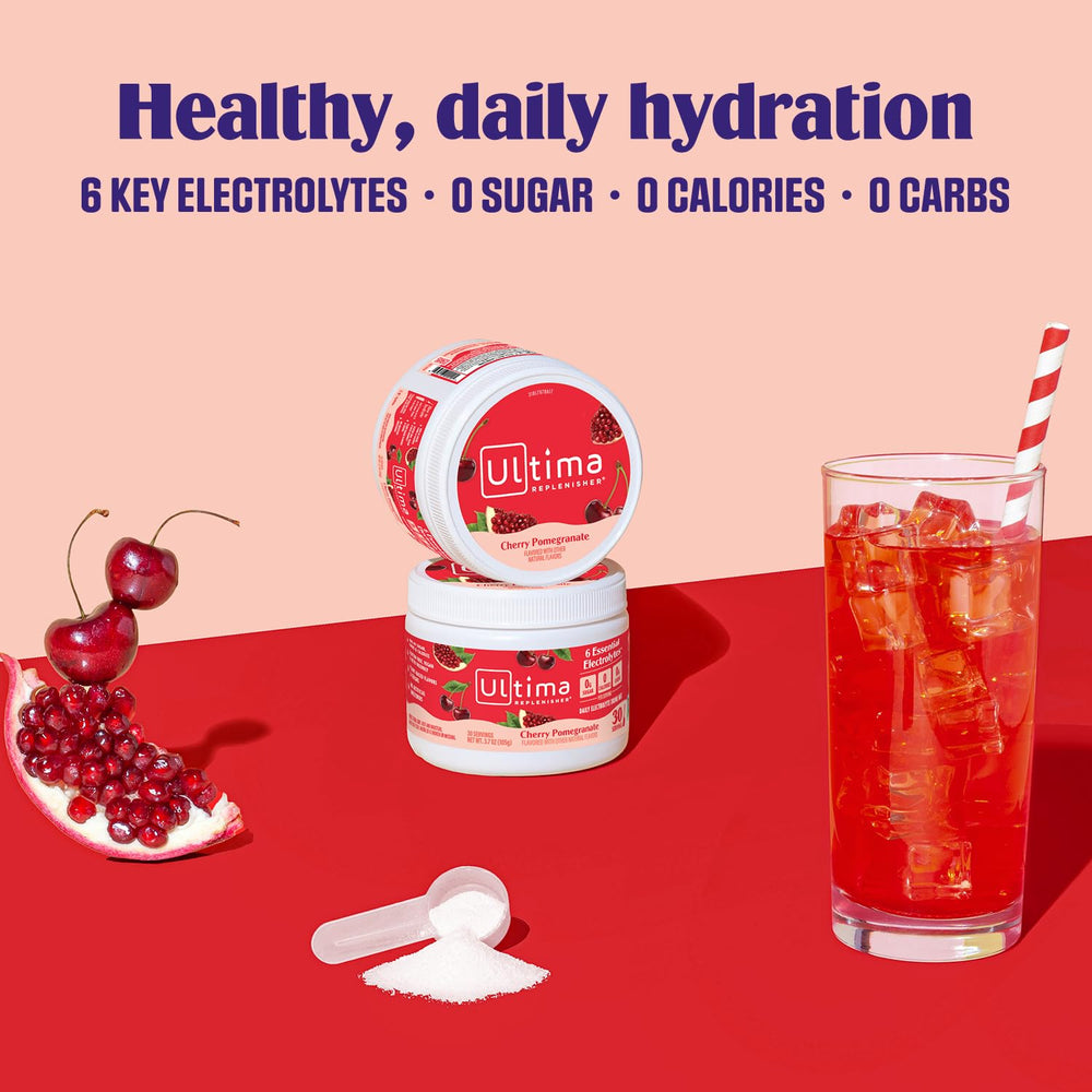 Powder being poured into a chilled glass of water with Ultima Replenisher.