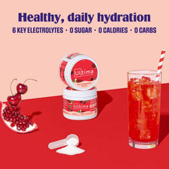 Powder being poured into a chilled glass of water with Ultima Replenisher.