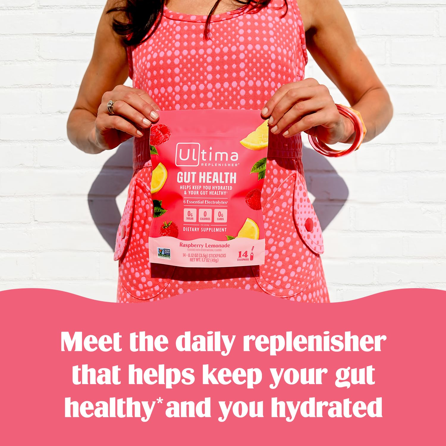 Pouring Ultima Replenisher into water for hydration