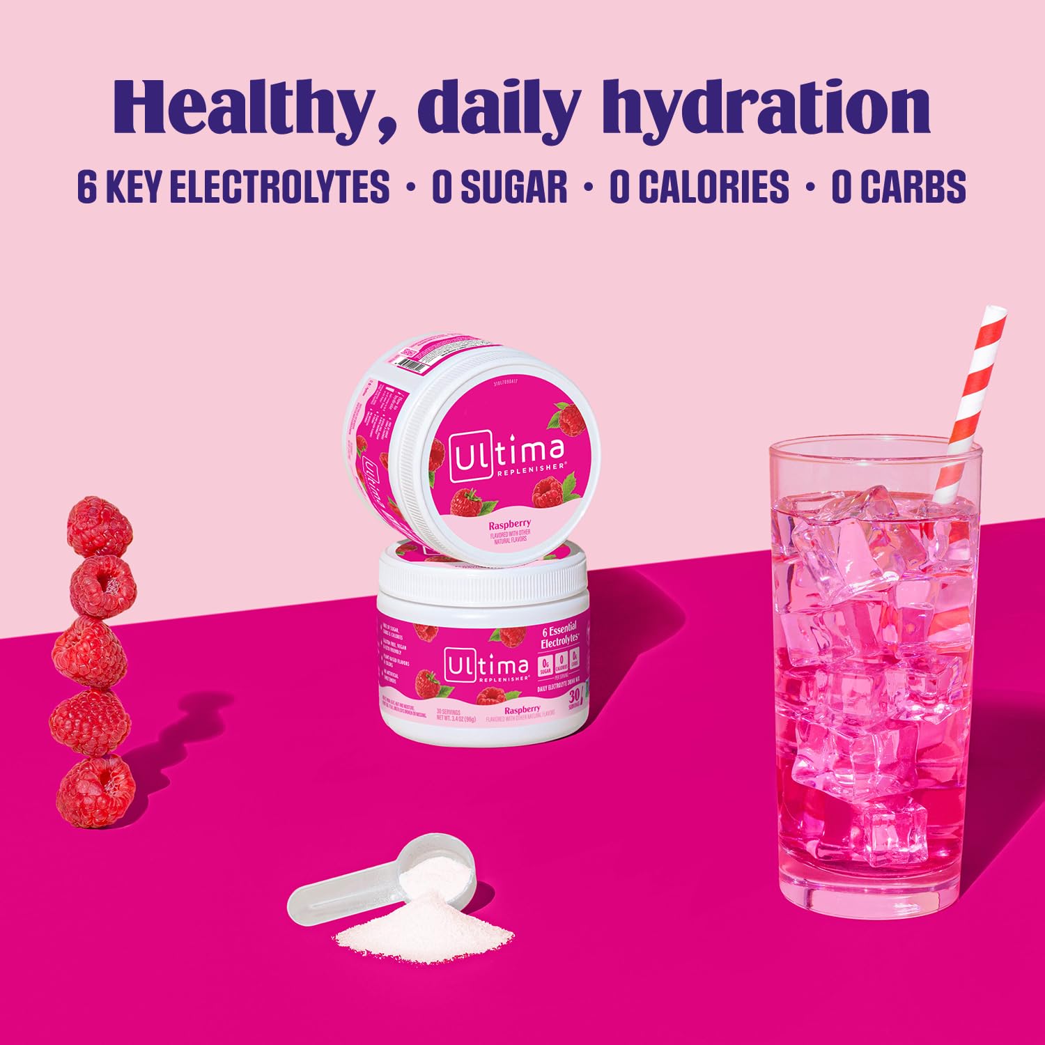 Cold raspberry electrolyte drink in a glass, perfect after workouts.