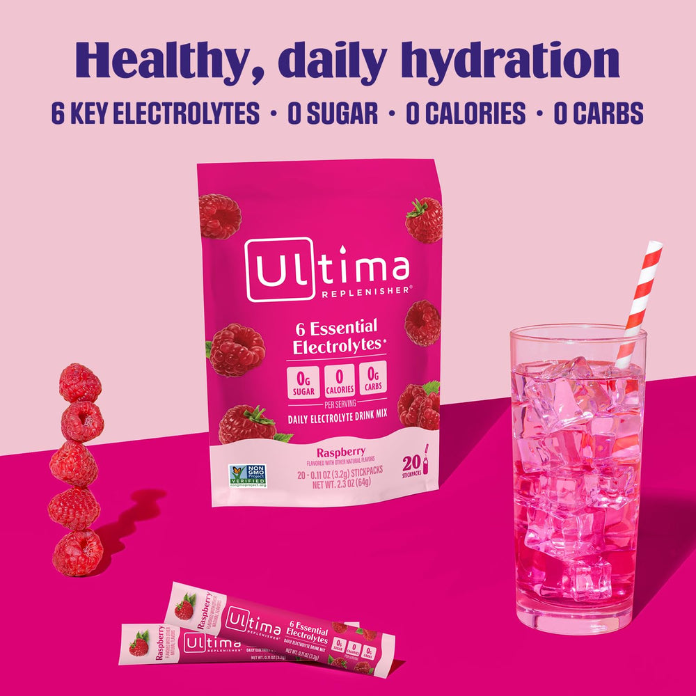 A glass of Ultima Replenisher Raspberry drink shows vibrant, sugar-free hydration.