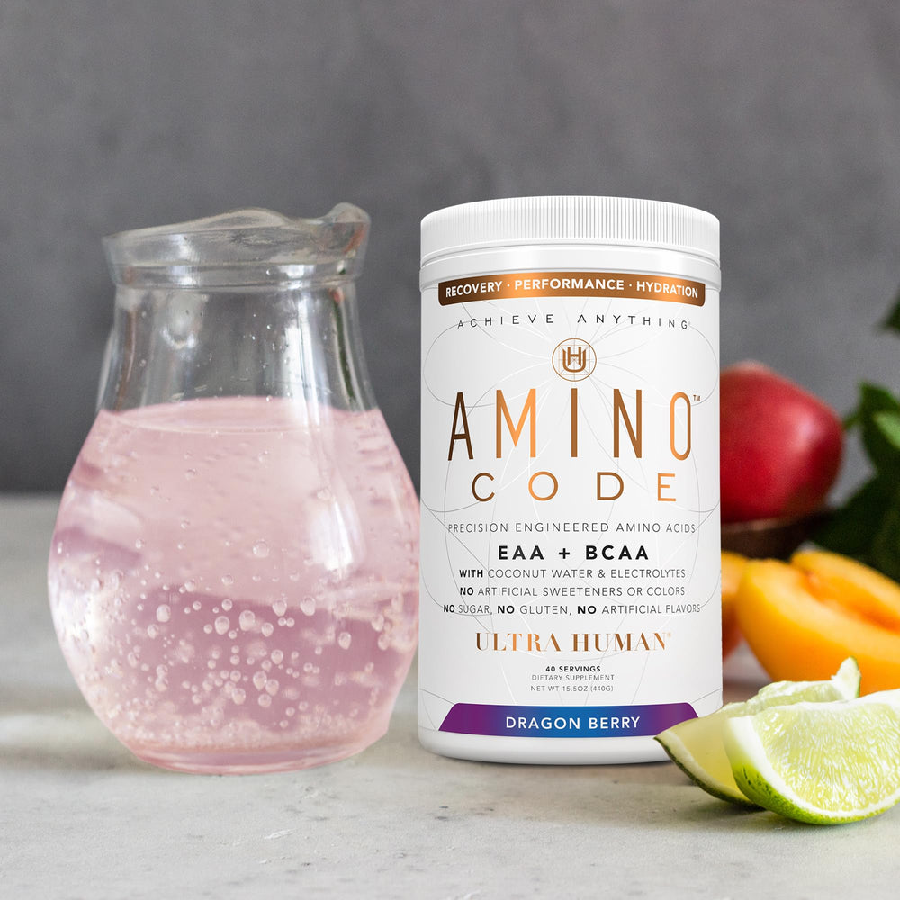 Chilled Ultra Human Amino Code Dragonberry in an ice-cold glass after training.