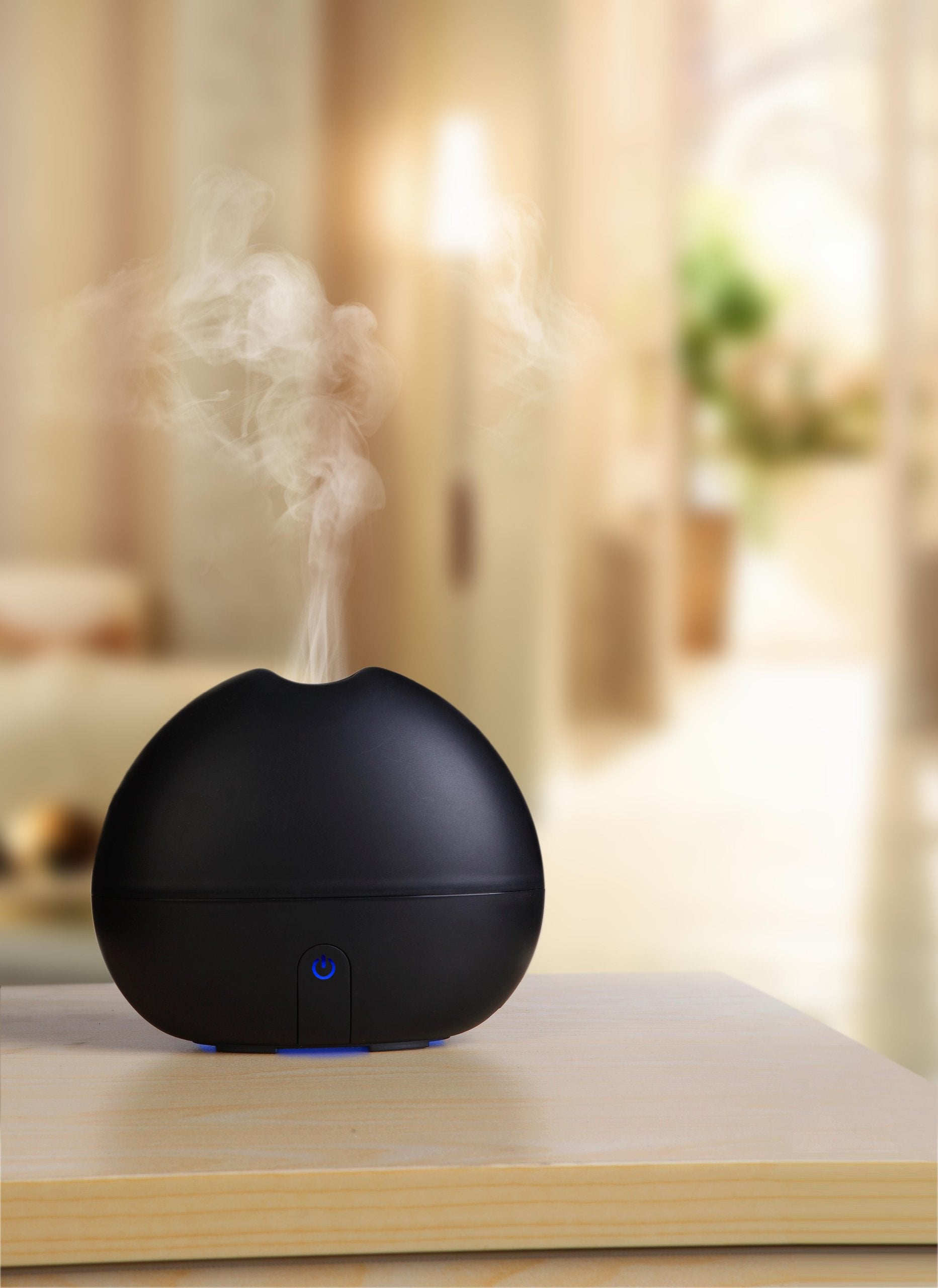 Ultransmit ipple diffuser front view with ambient LED glow for mood lighting.