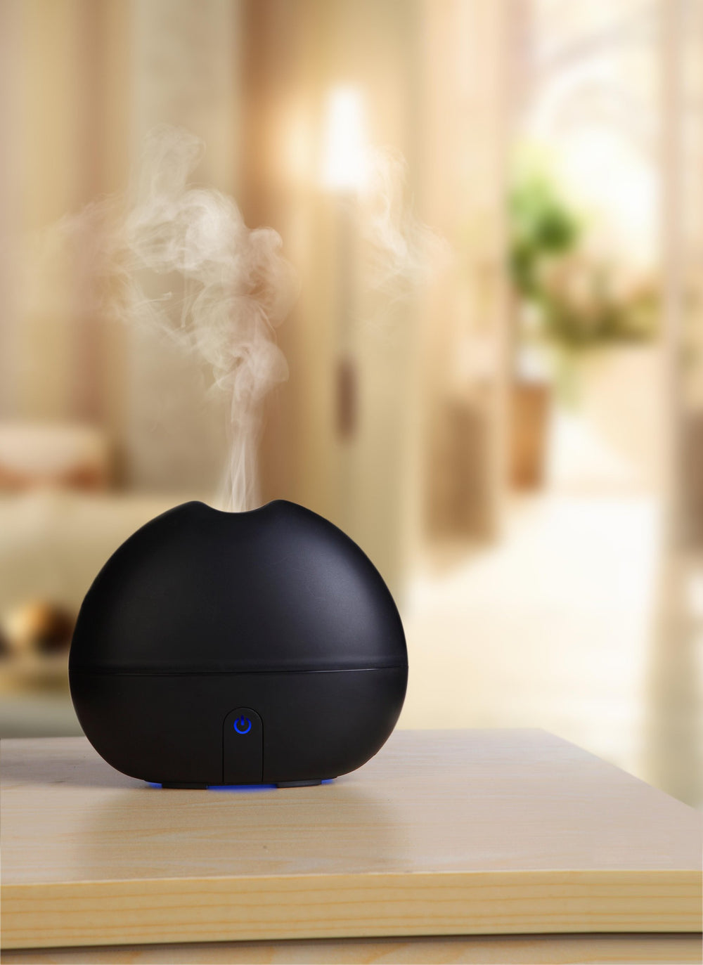 Ultransmit ipple diffuser front view with ambient LED glow for mood lighting.