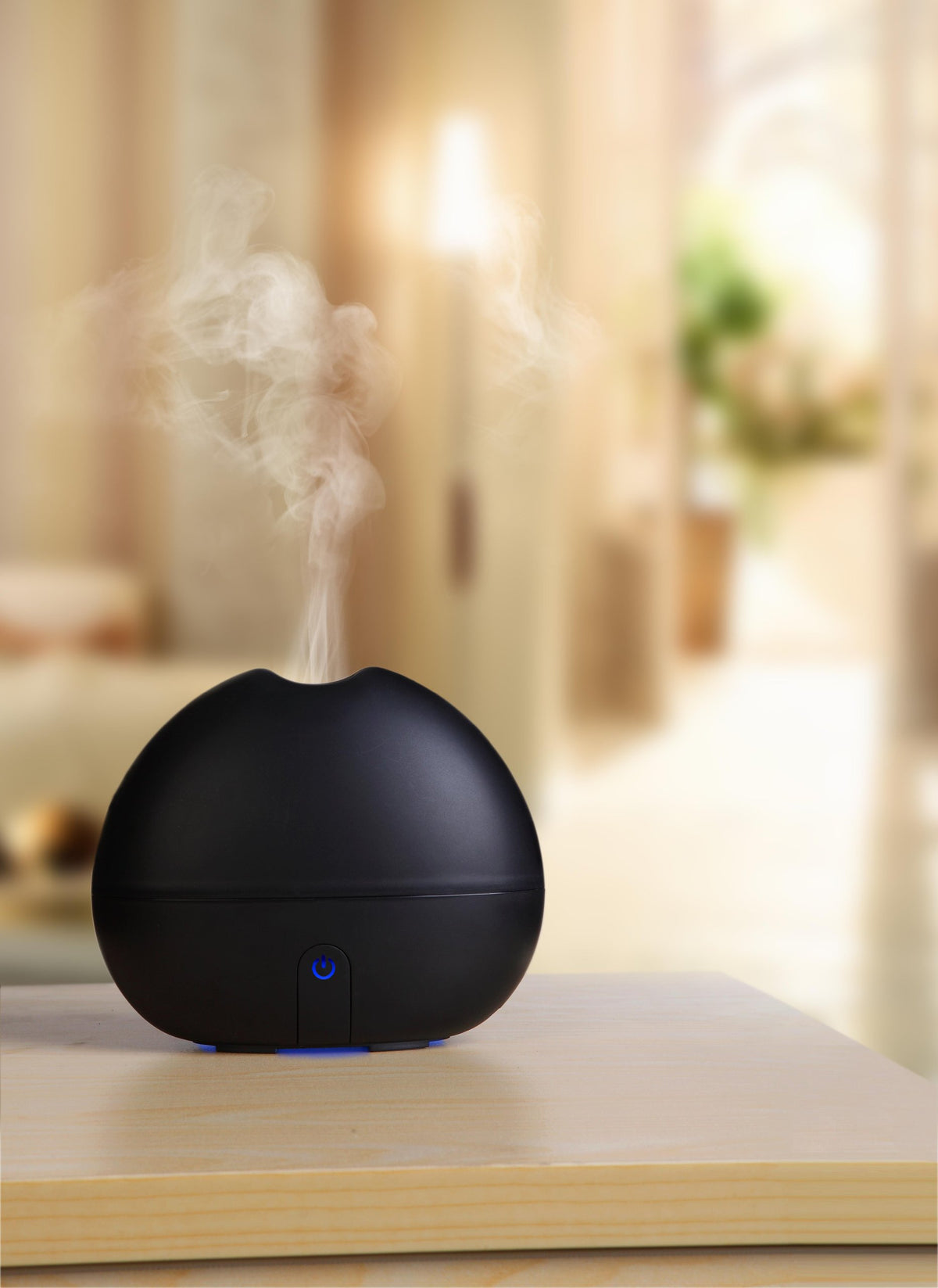 Ultransmit ipple diffuser front view with ambient LED glow for mood lighting.