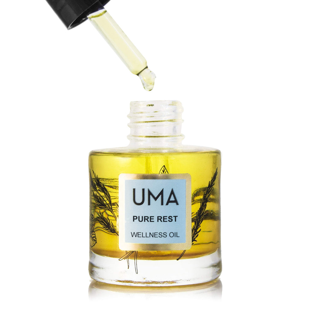 UMA Pure Rest bottle closeup shows organic ingredients and soothing aroma.